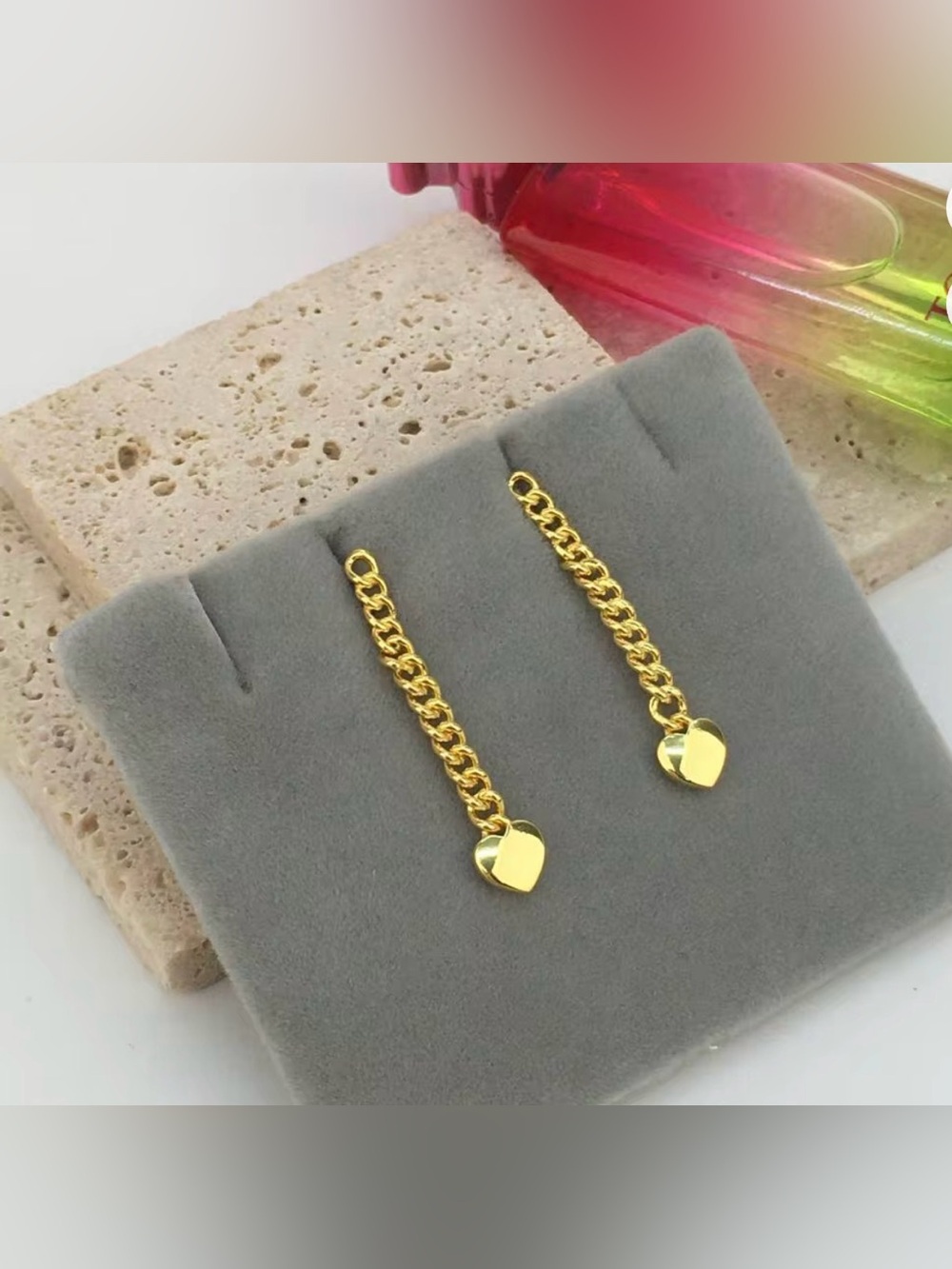 Bold Motif long earrings with gold plating on silver and heart motif. 925